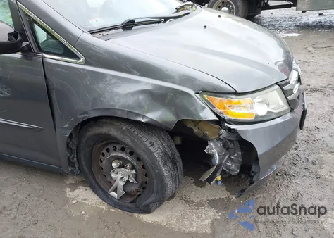 2014 Honda Odyssey Lx z USA, uszkodzony, nr VIN 5FNRL5H24EB129725